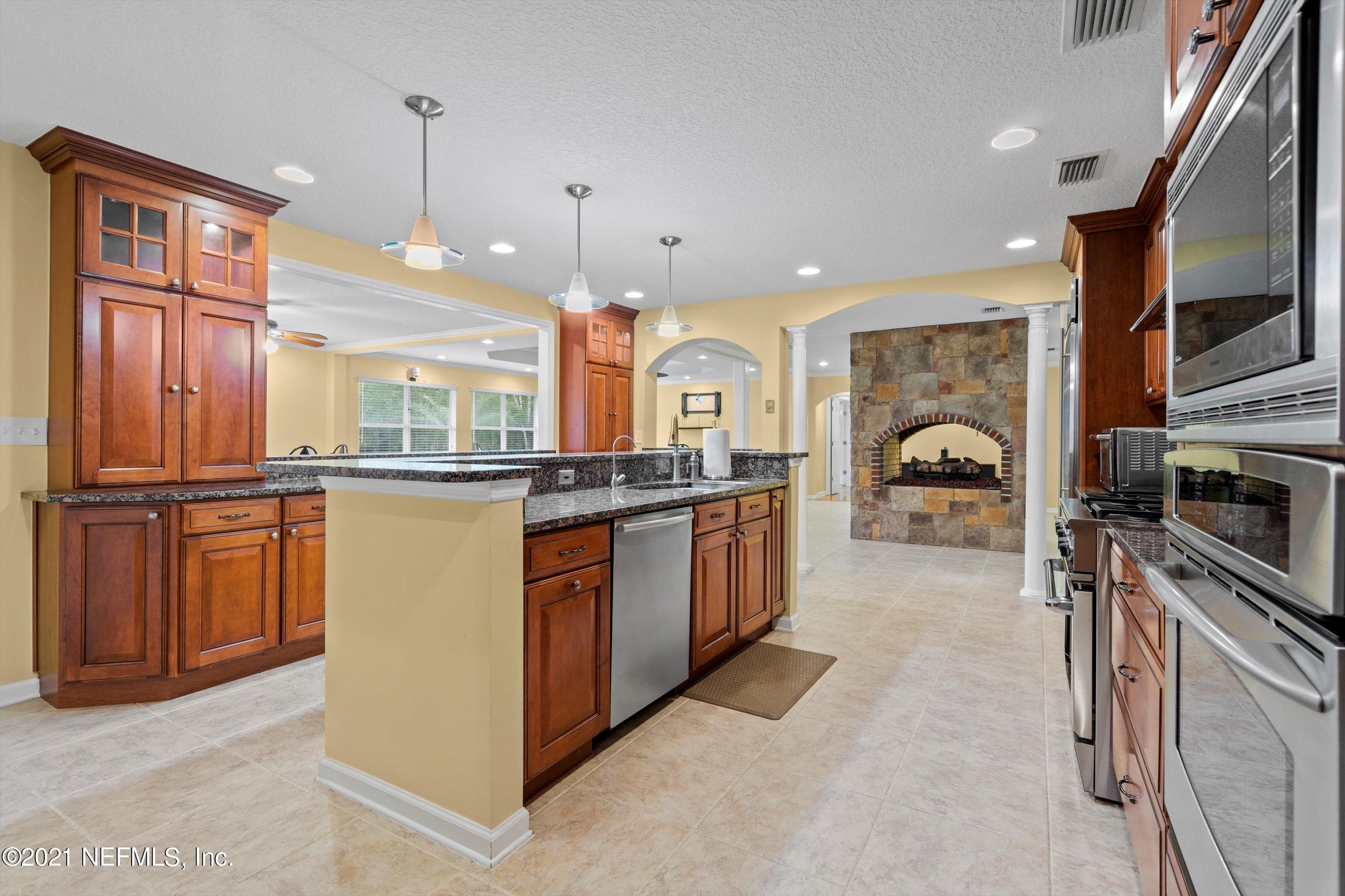 241 Holly Knowe Road Fleming Island, FL 32003 - Photo 8 of 28 Kitchen to Breakfast Bar