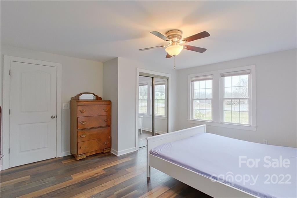 3701 Parkwood School Road Monroe, NC 28112 - Photo 26 of 36 a bedroom with a bed and a window
