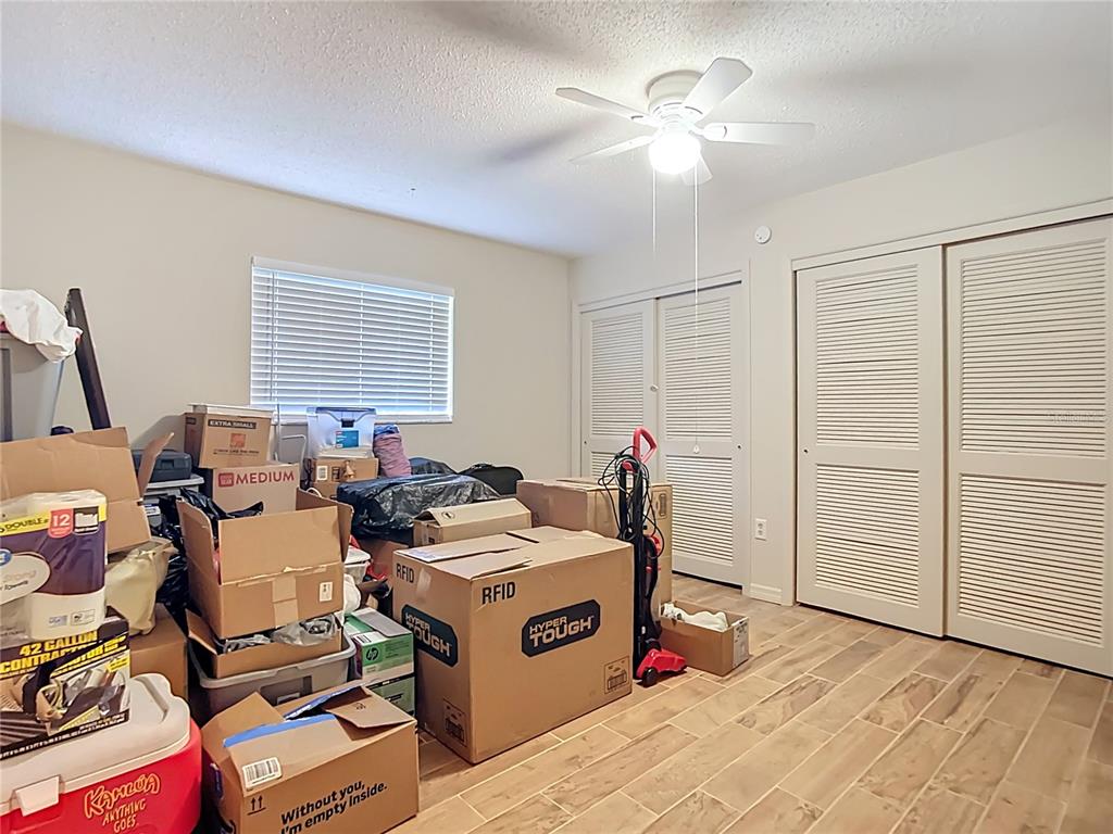 5964 Diana Road Venice, FL 34293 - Photo 16 of 27 a view of a workspace with furniture and a window