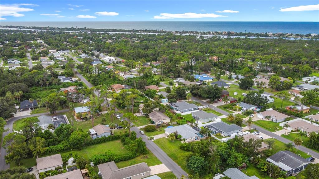 5964 Diana Road Venice, FL 34293 - Photo 2 of 27 an aerial view of residential houses with outdoor space and street view
