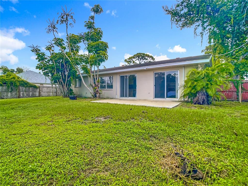 5964 Diana Road Venice, FL 34293 - Photo 25 of 27 a front view of house with yard and green space