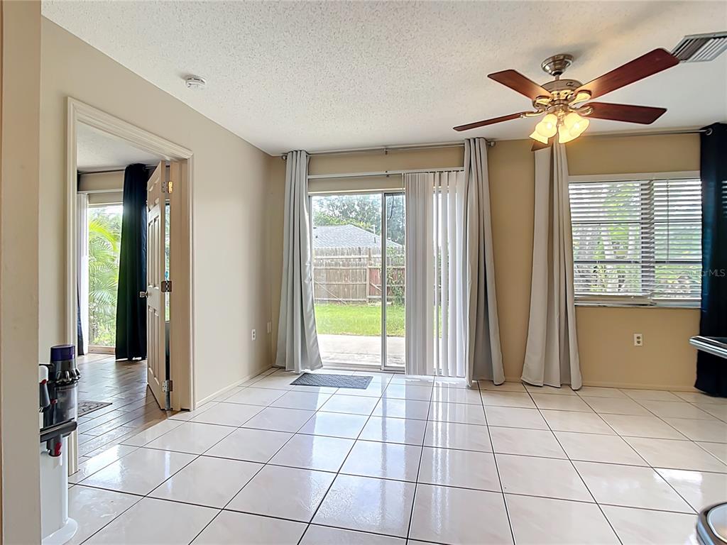 5964 Diana Road Venice, FL 34293 - Photo 9 of 27 a view of an entryway with a chandelier