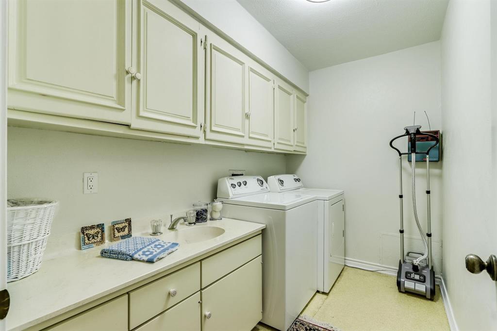 9310 Waterview Road Dallas, TX 75218 - Photo 24 of 35 a utility room with dryer and washer
