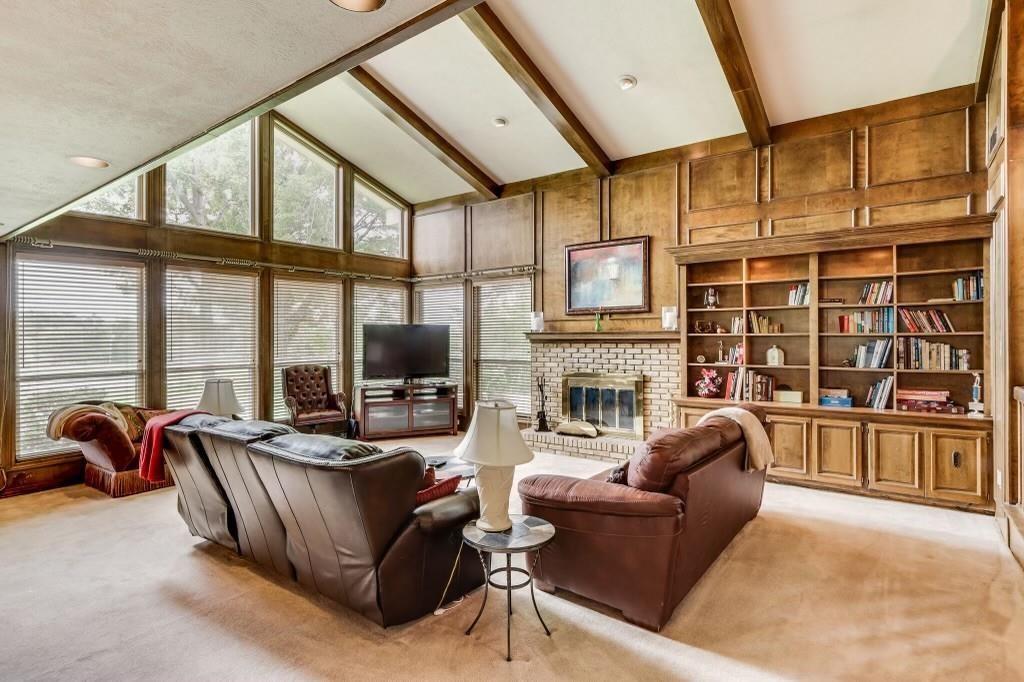 9310 Waterview Road Dallas, TX 75218 - Photo 5 of 35 a living room with furniture or fireplace and a flat screen tv