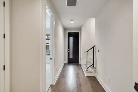 a view of hallway with stairs