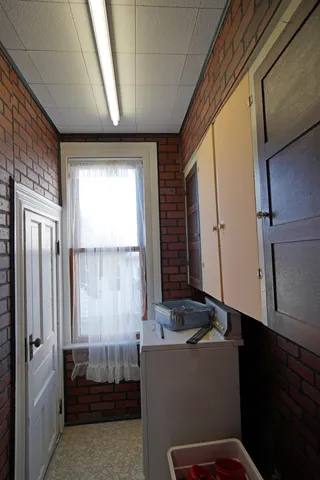 a room with furniture and window