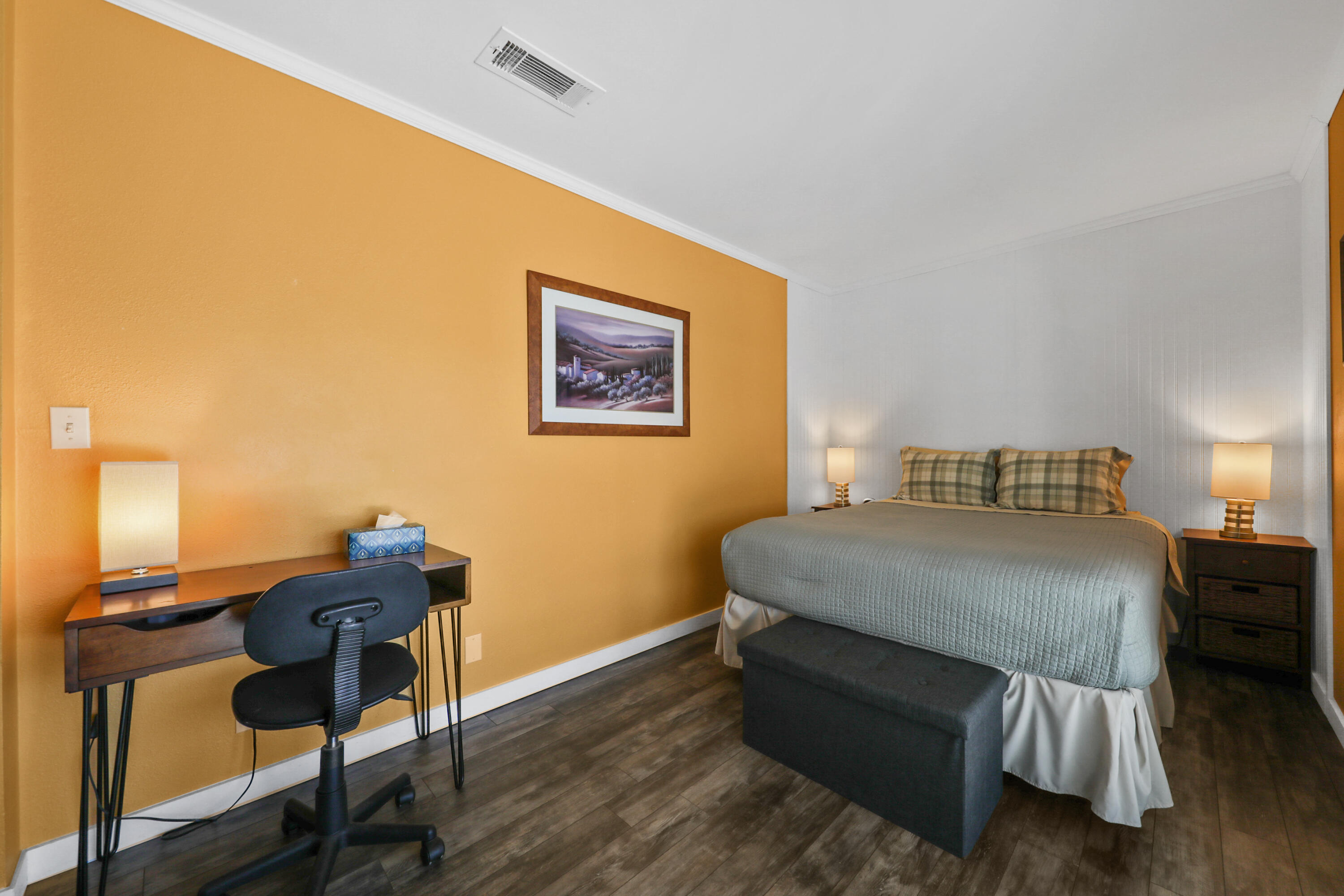 70171 Chappel Road Rancho Mirage, CA 92270 - Photo 19 of 38 a bedroom with a bed and a table in it