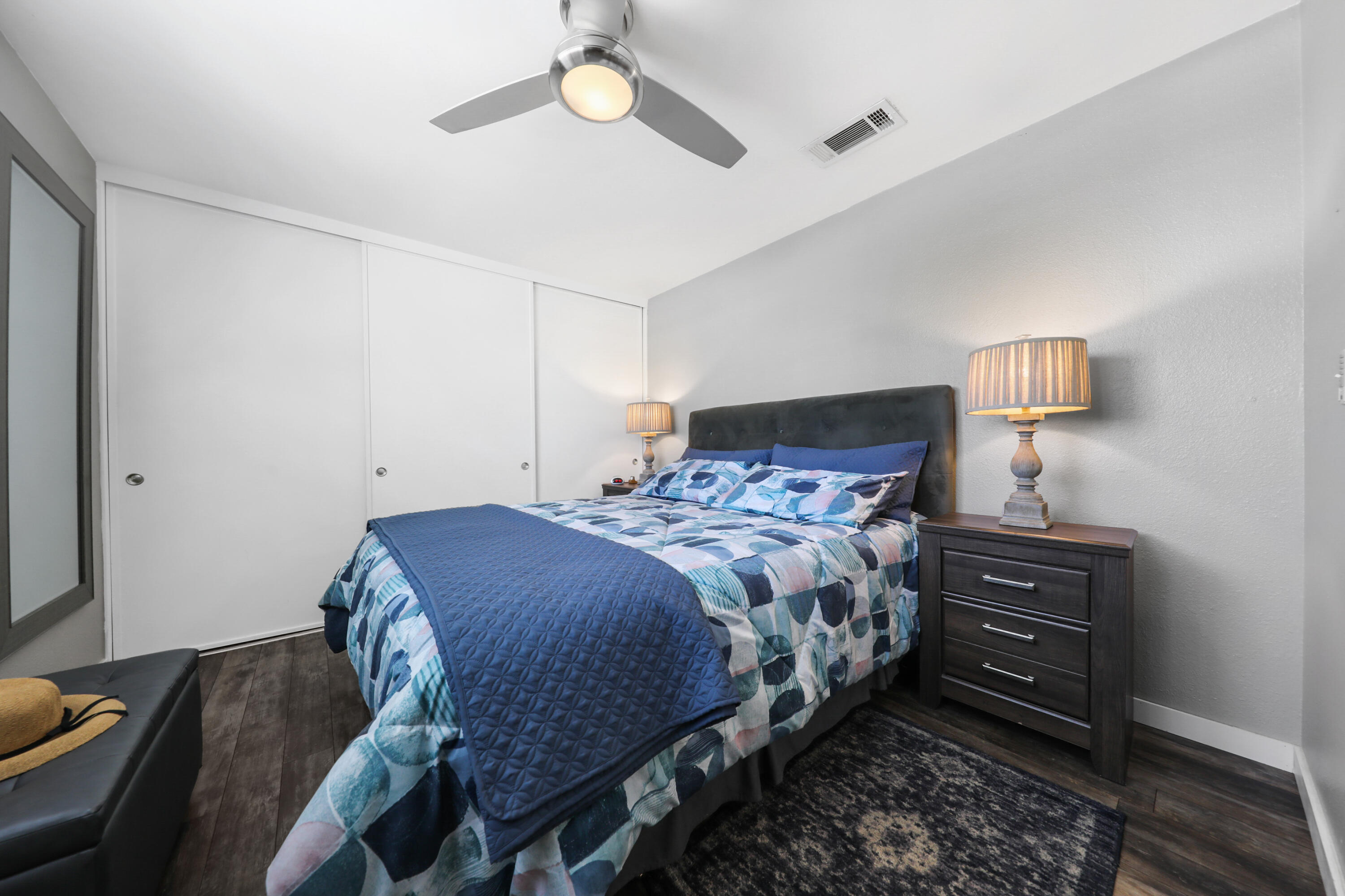 70171 Chappel Road Rancho Mirage, CA 92270 - Photo 21 of 38 a bedroom with a bed and a chandelier