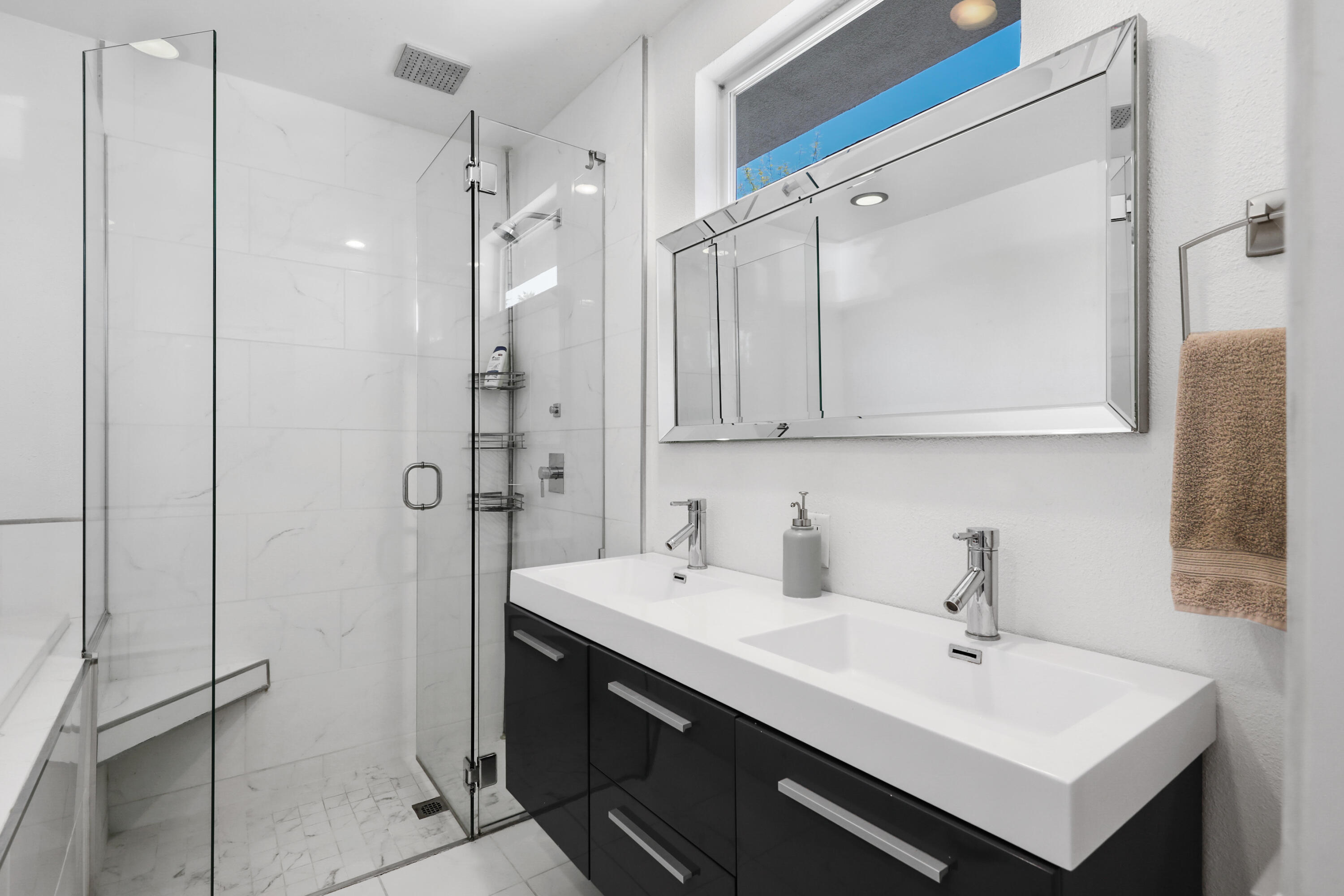 70171 Chappel Road Rancho Mirage, CA 92270 - Photo 23 of 38 a bathroom with a double vanity sink mirror and shower