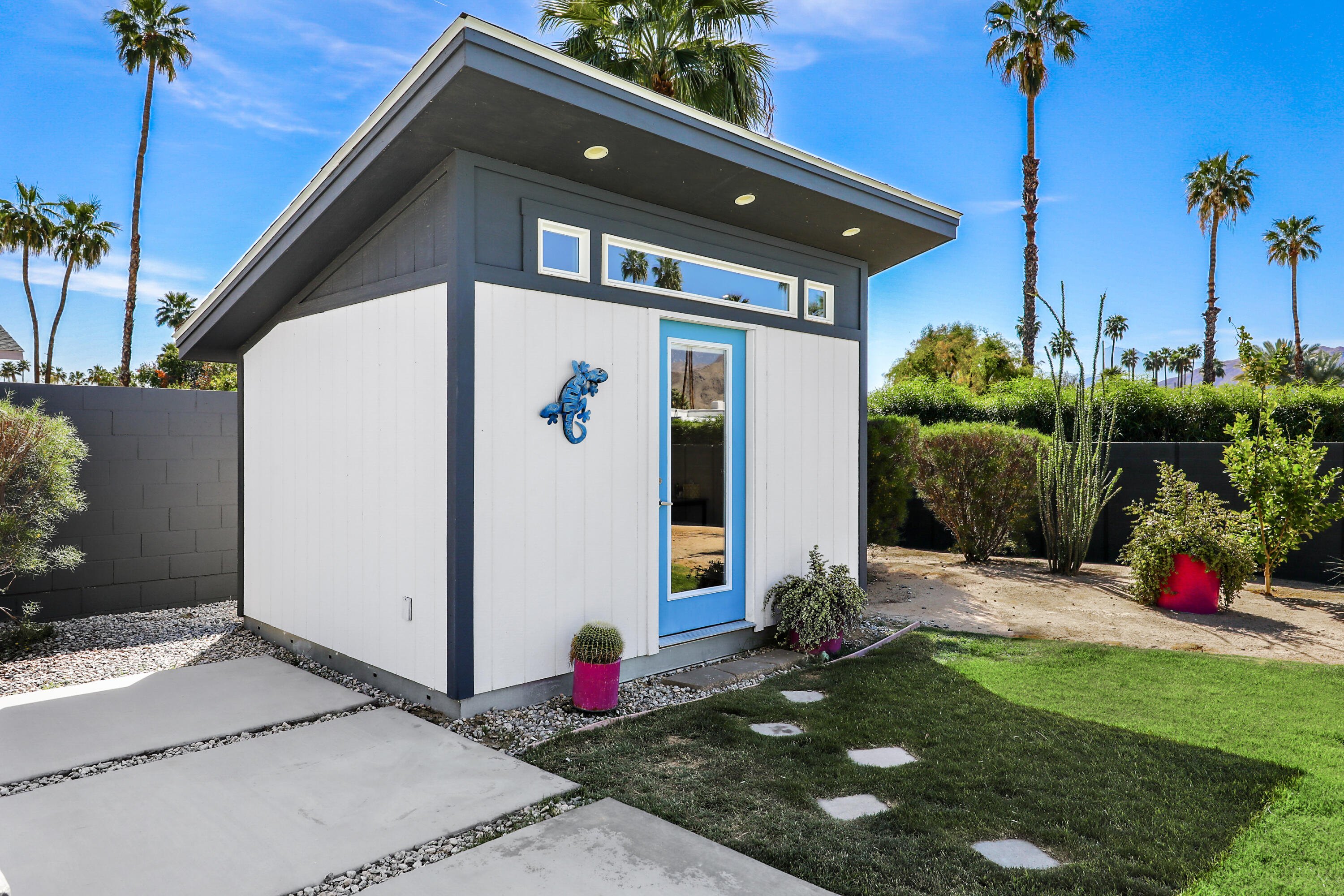 70171 Chappel Road Rancho Mirage, CA 92270 - Photo 25 of 38 a view of a house with a small yard
