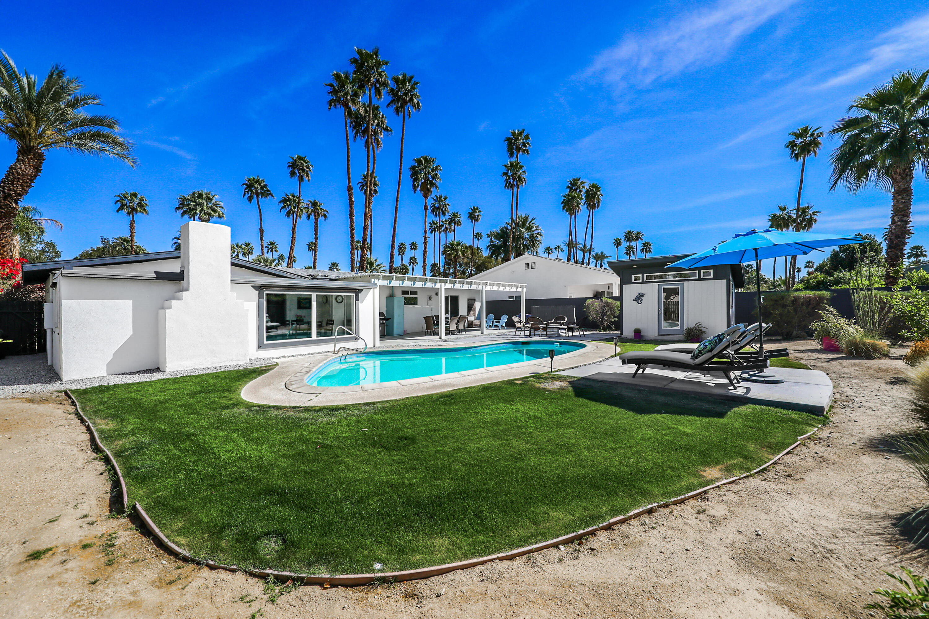 70171 Chappel Road Rancho Mirage, CA 92270 - Photo 29 of 38 a view of a swimming pool with a patio