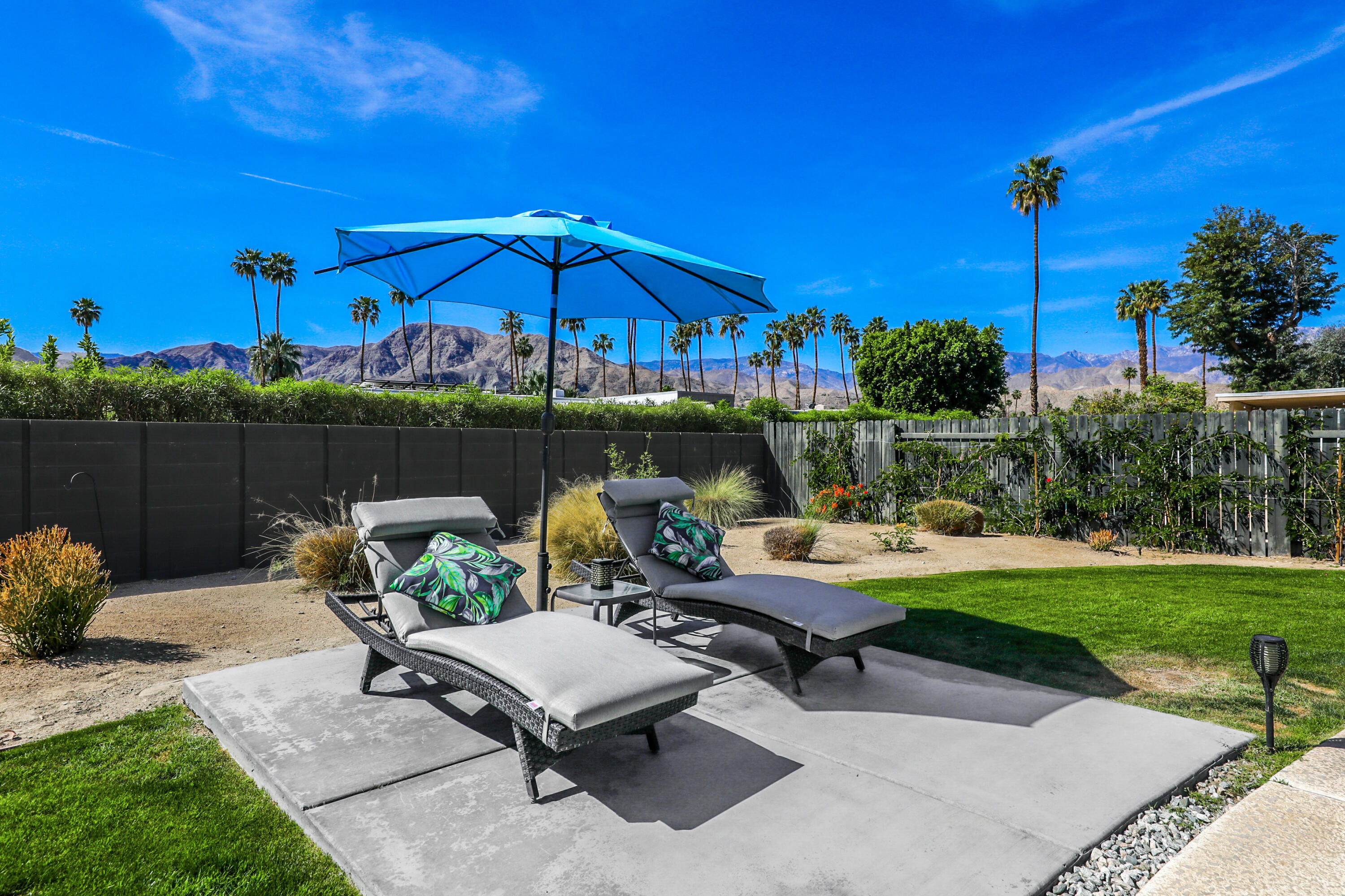 70171 Chappel Road Rancho Mirage, CA 92270 - Photo 32 of 38 a view of a terrace with furniture and a fire pit