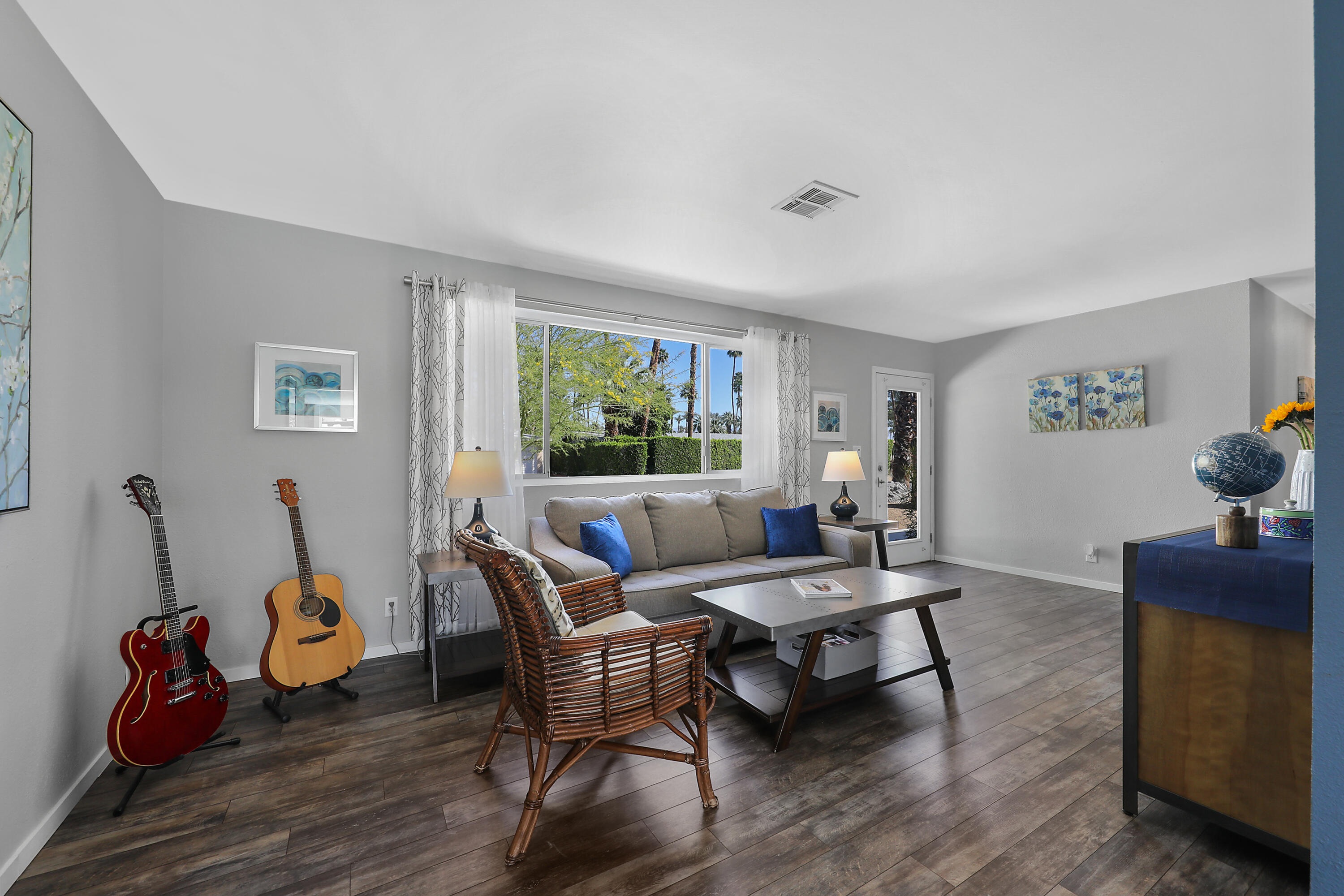 70171 Chappel Road Rancho Mirage, CA 92270 - Photo 9 of 38 a living room with furniture and wooden floor