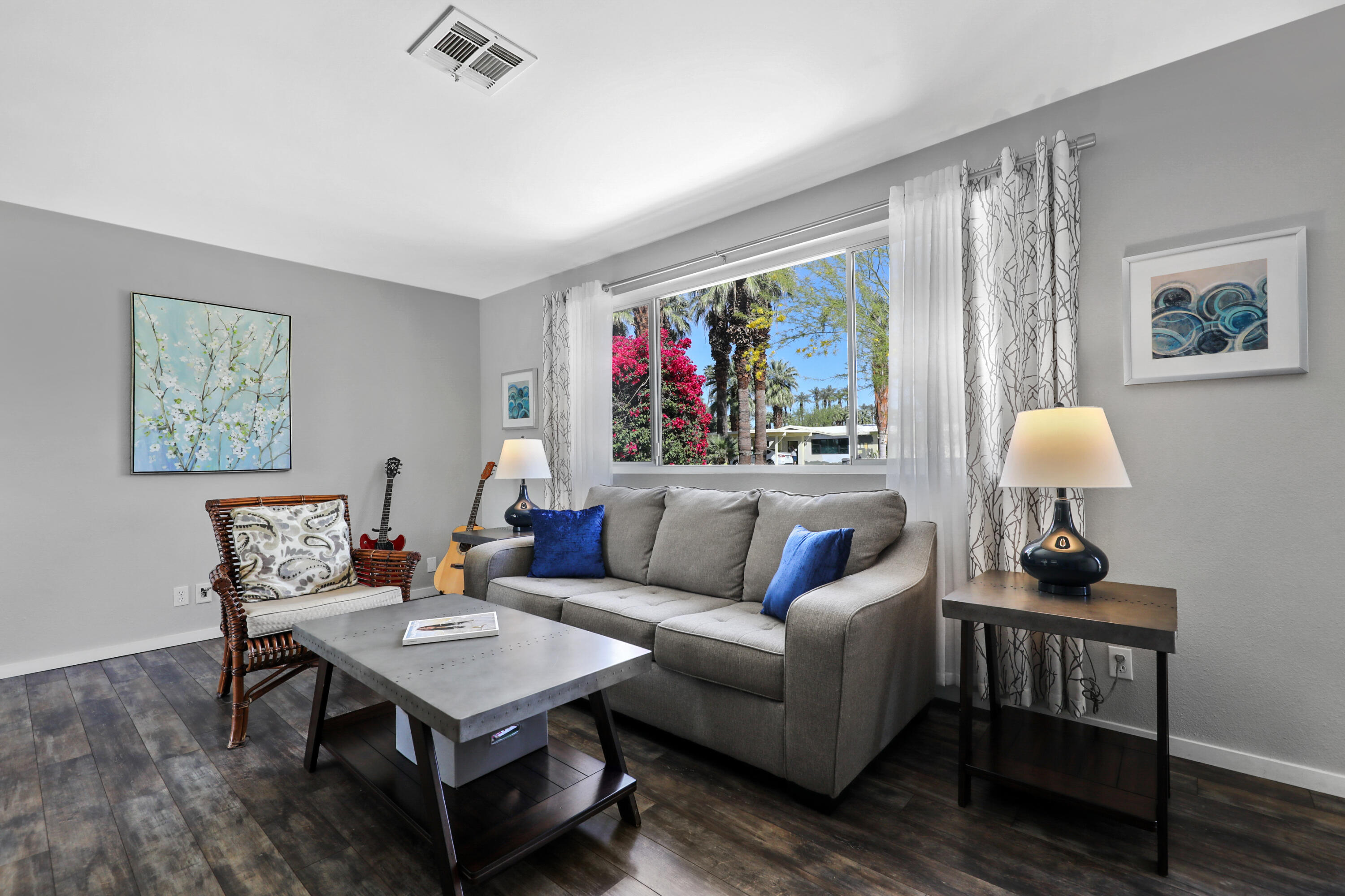 70171 Chappel Road Rancho Mirage, CA 92270 - Photo 10 of 38 a living room with furniture a rug and a window