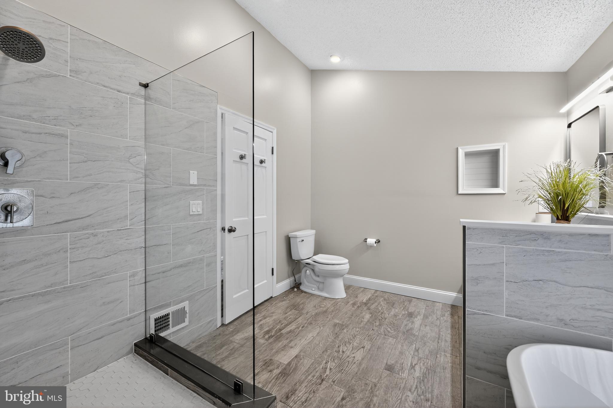 1656 South Ash Circle Jamison, PA 18929 - Photo 20 of 30 a bathroom with a toilet and a shower