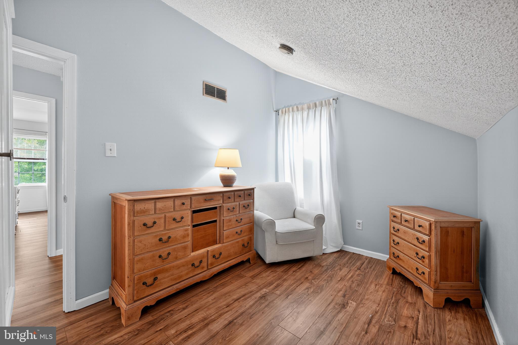 1656 South Ash Circle Jamison, PA 18929 - Photo 22 of 30 a living room with furniture and wooden floor