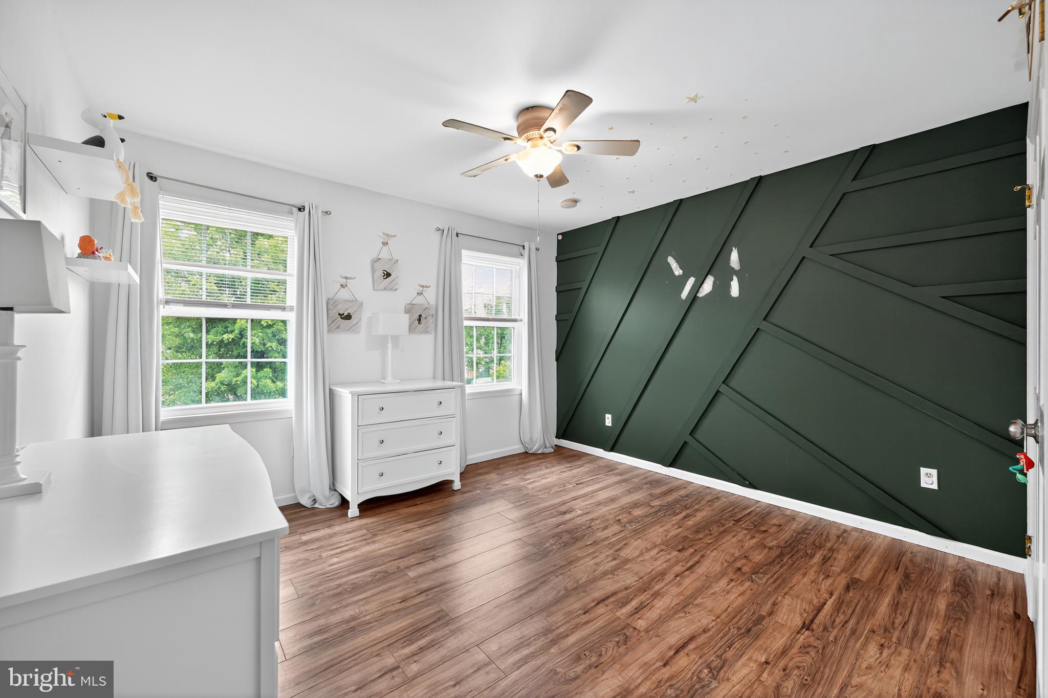 1656 South Ash Circle Jamison, PA 18929 - Photo 24 of 30 a view of a livingroom with furniture and cabinet with wooden floor
