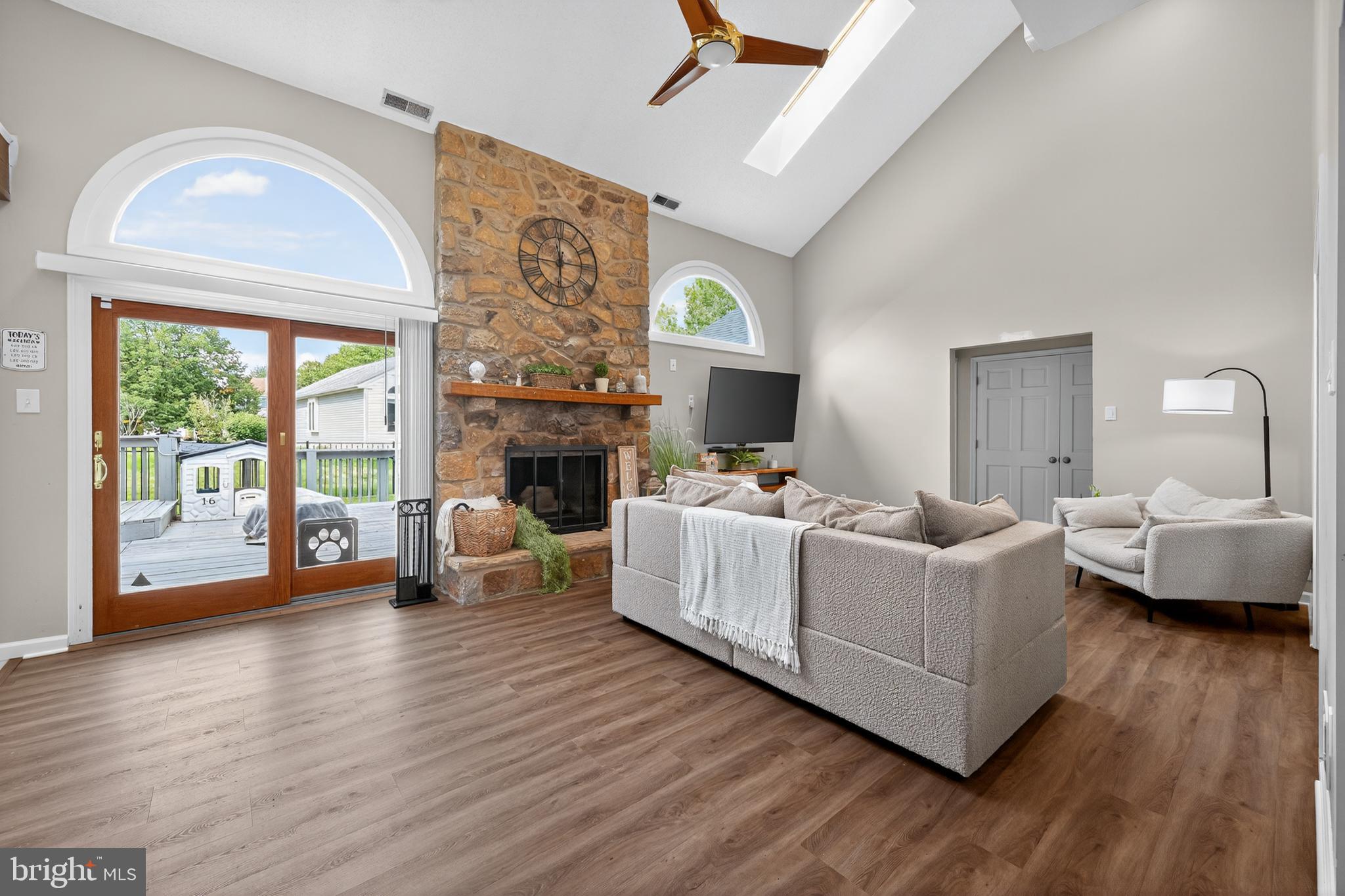 1656 South Ash Circle Jamison, PA 18929 - Photo 4 of 30 a living room with furniture and a fireplace