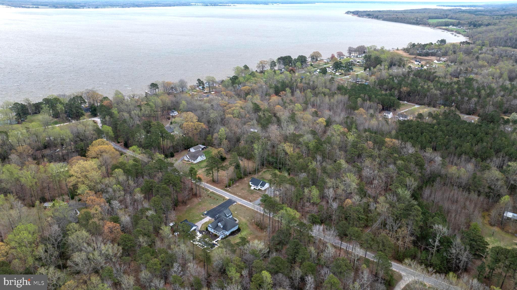 300 River Oaks Road Center Cross, VA 22437 - Photo 4 of 39 Serene lakeside community retreat.
