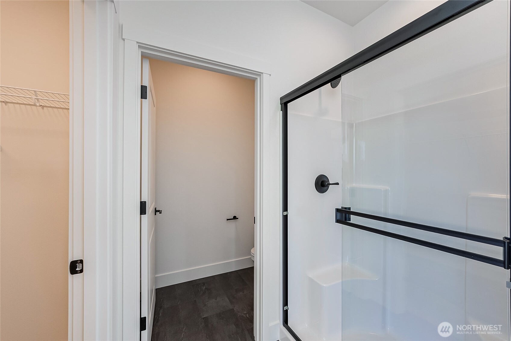 402 Pagget Avenue Winlock, WA 98596 - Photo 18 of 36 a bathroom with a glass shower door