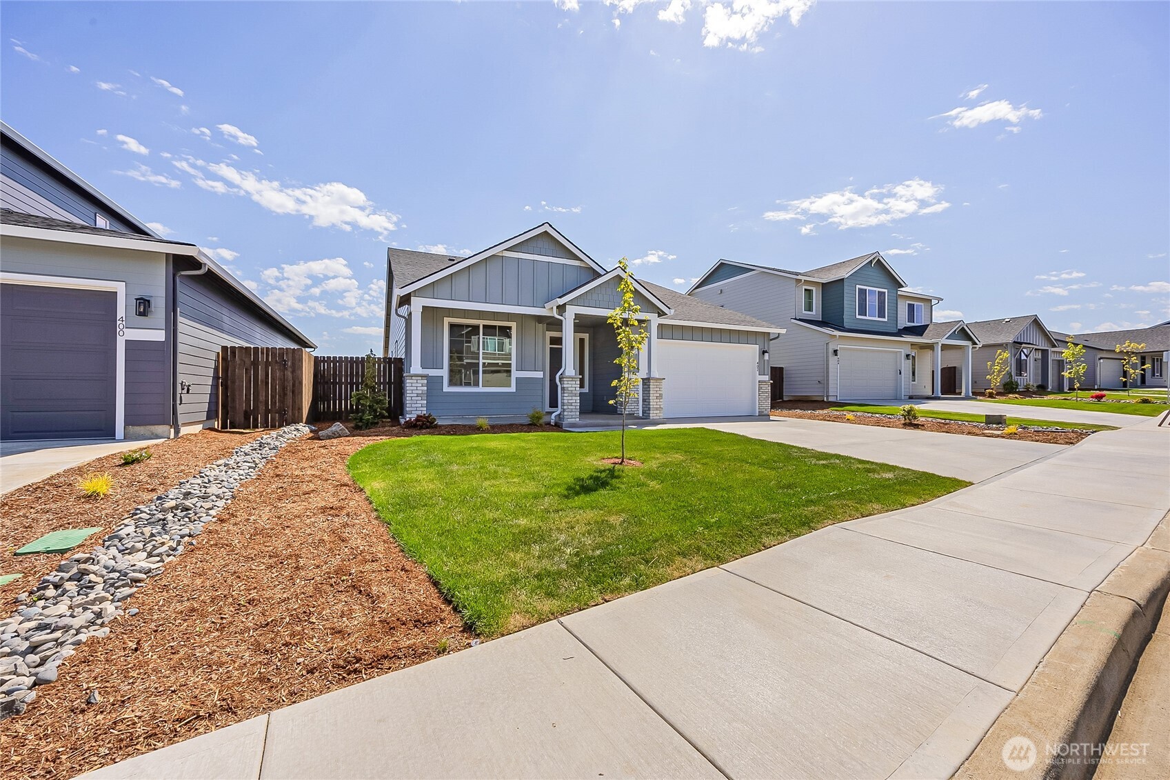 402 Pagget Avenue Winlock, WA 98596 - Photo 2 of 36 front view of a house with a yard