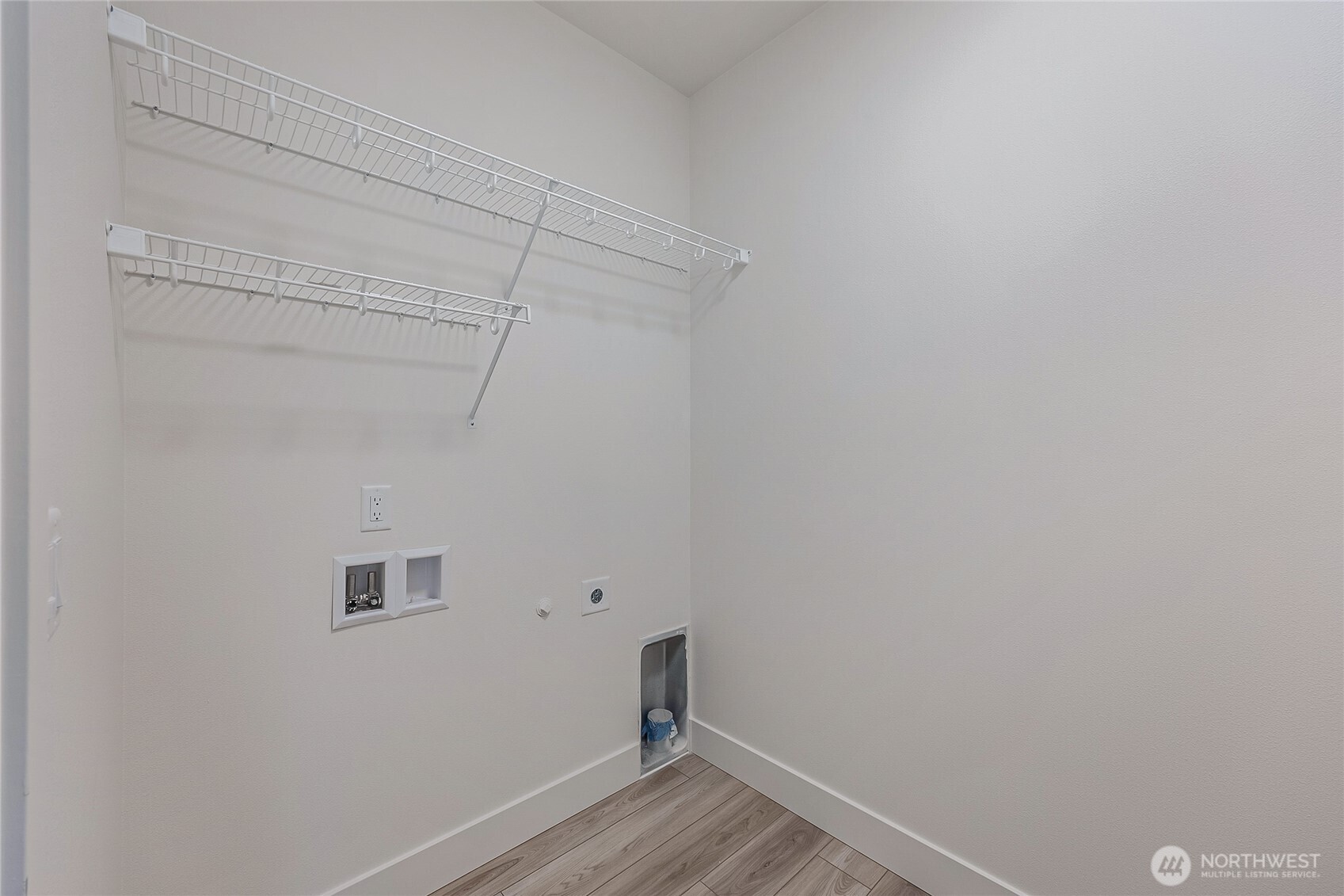 402 Pagget Avenue Winlock, WA 98596 - Photo 29 of 36 a view of a room with wooden floor
