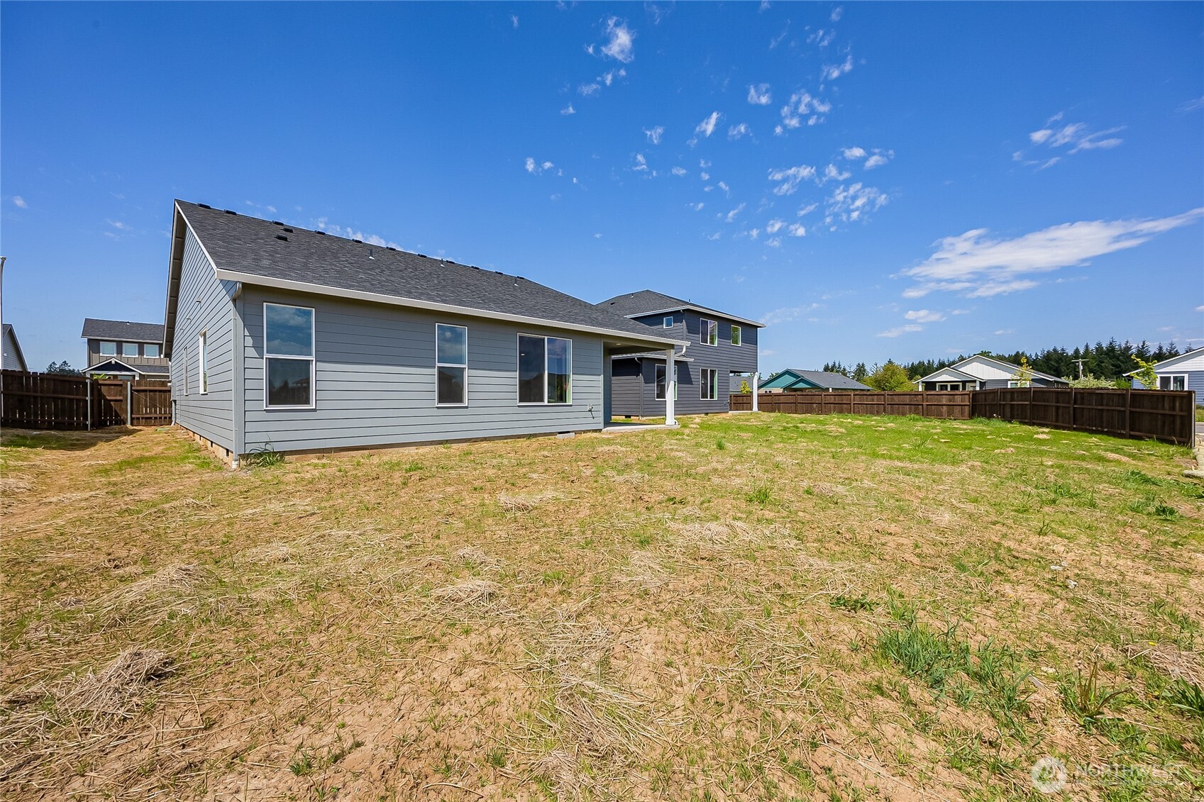 402 Pagget Avenue Winlock, WA 98596 - Photo 33 of 36 a house with swimming pool in front of it