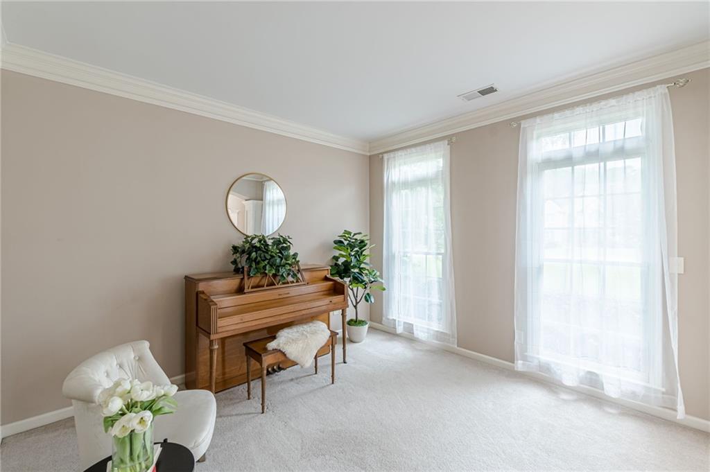 700 James Madison Drive South Fulton, GA 30331 - Photo 11 of 57 a living room with furniture and a potted plant