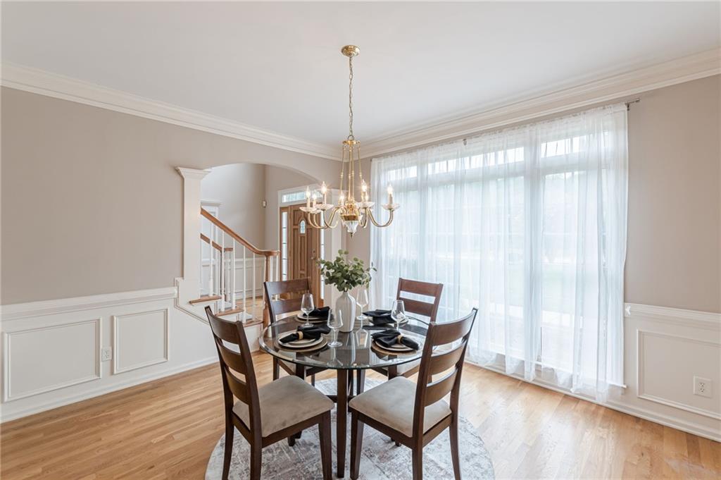 700 James Madison Drive South Fulton, GA 30331 - Photo 16 of 57 a view of a dining room with furniture window and wooden floor