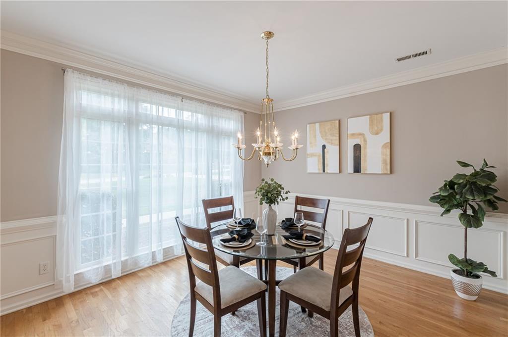700 James Madison Drive South Fulton, GA 30331 - Photo 17 of 57 a view of a dining room with furniture window and wooden floor