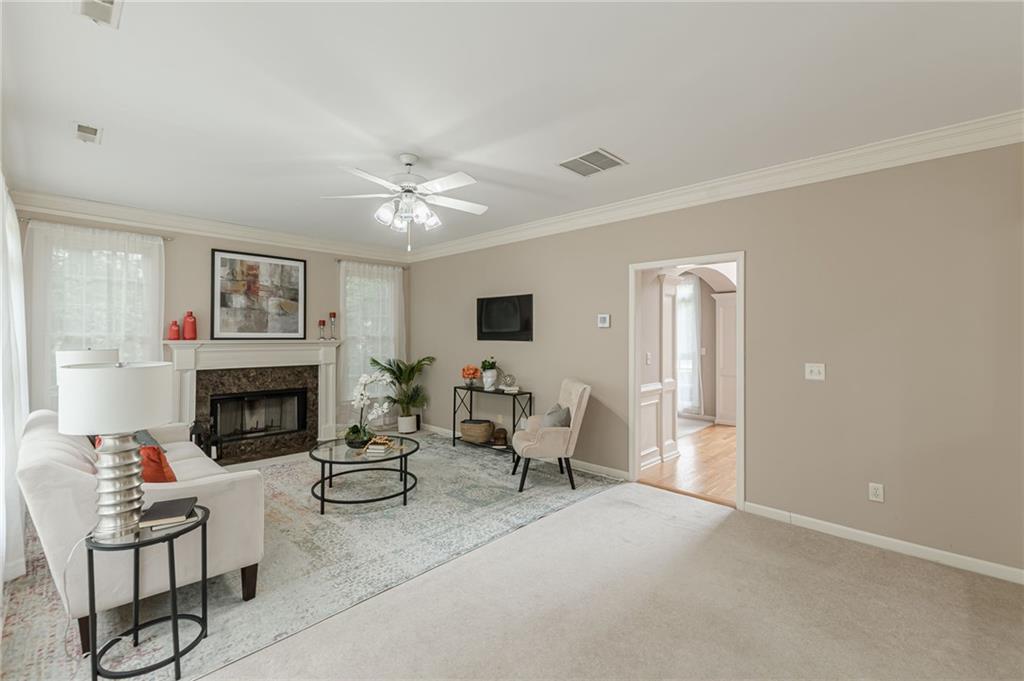 700 James Madison Drive South Fulton, GA 30331 - Photo 27 of 57 a living room with furniture and a fireplace