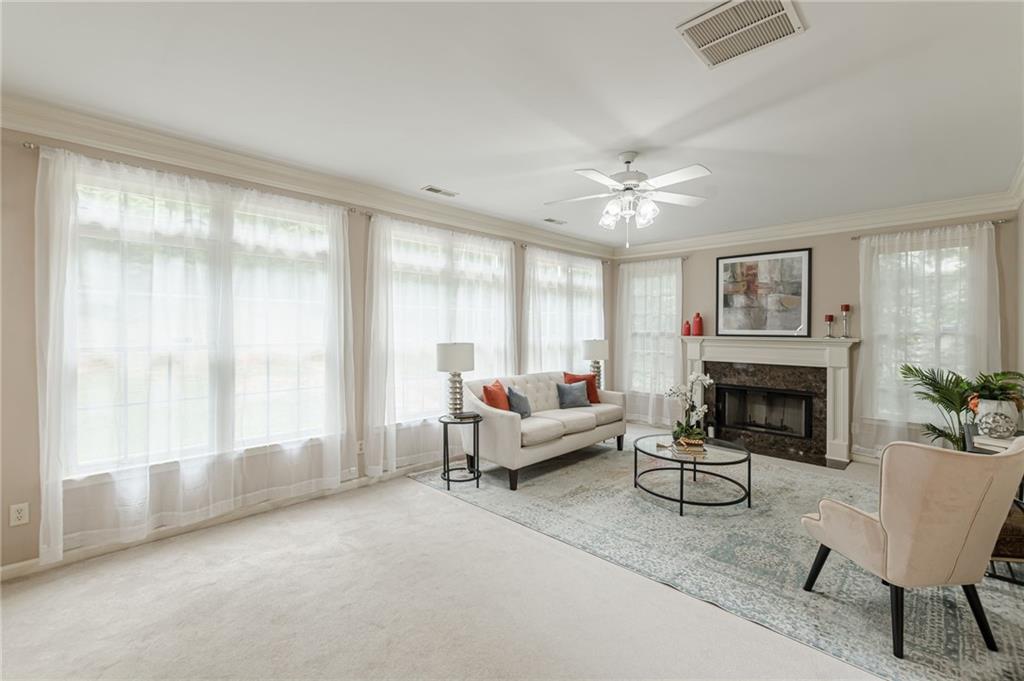 700 James Madison Drive South Fulton, GA 30331 - Photo 28 of 57 a living room with furniture and a fireplace