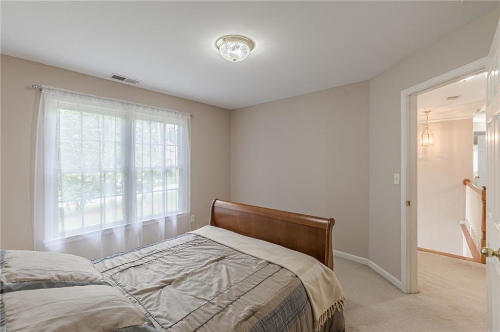 700 James Madison Drive South Fulton, GA 30331 - Photo 43 of 57 a bedroom with a bed and a window
