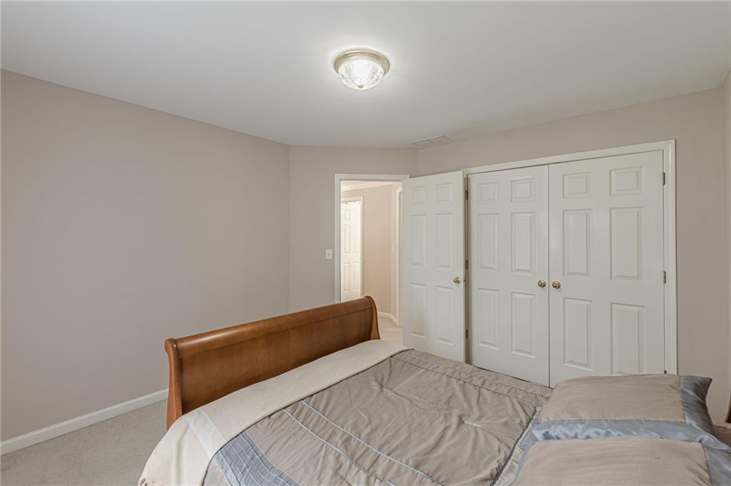 700 James Madison Drive South Fulton, GA 30331 - Photo 44 of 57 a bedroom with a bed and a window