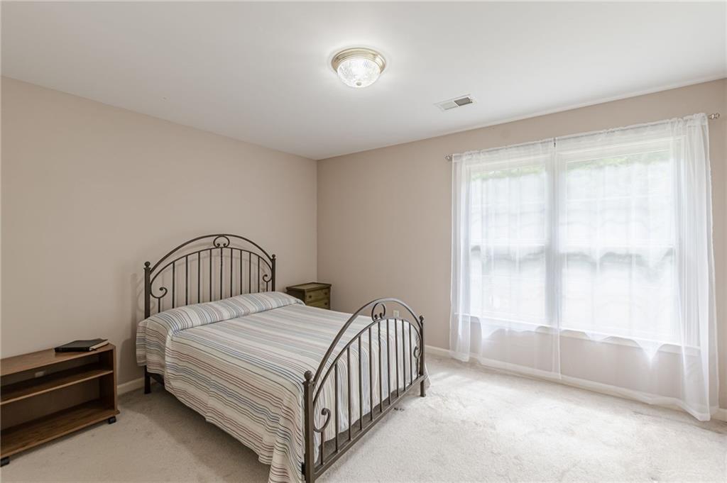 700 James Madison Drive South Fulton, GA 30331 - Photo 46 of 57 a bedroom with a bed and a window