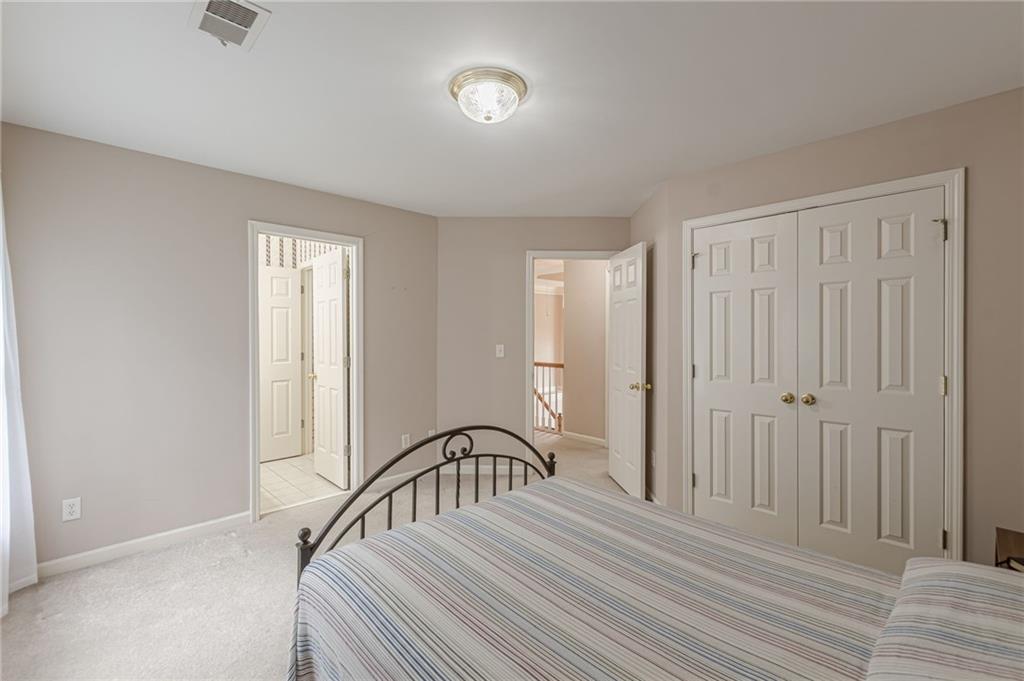 700 James Madison Drive South Fulton, GA 30331 - Photo 47 of 57 a view of a bedroom with a bed and a window