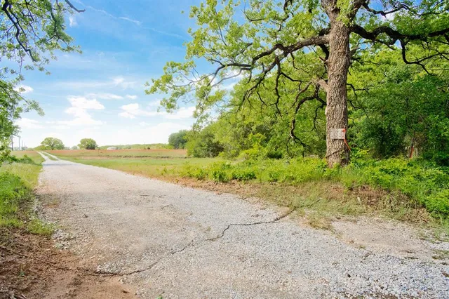 a view of a house with a big yard