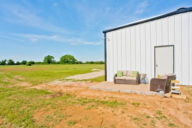 a house view with a backyard