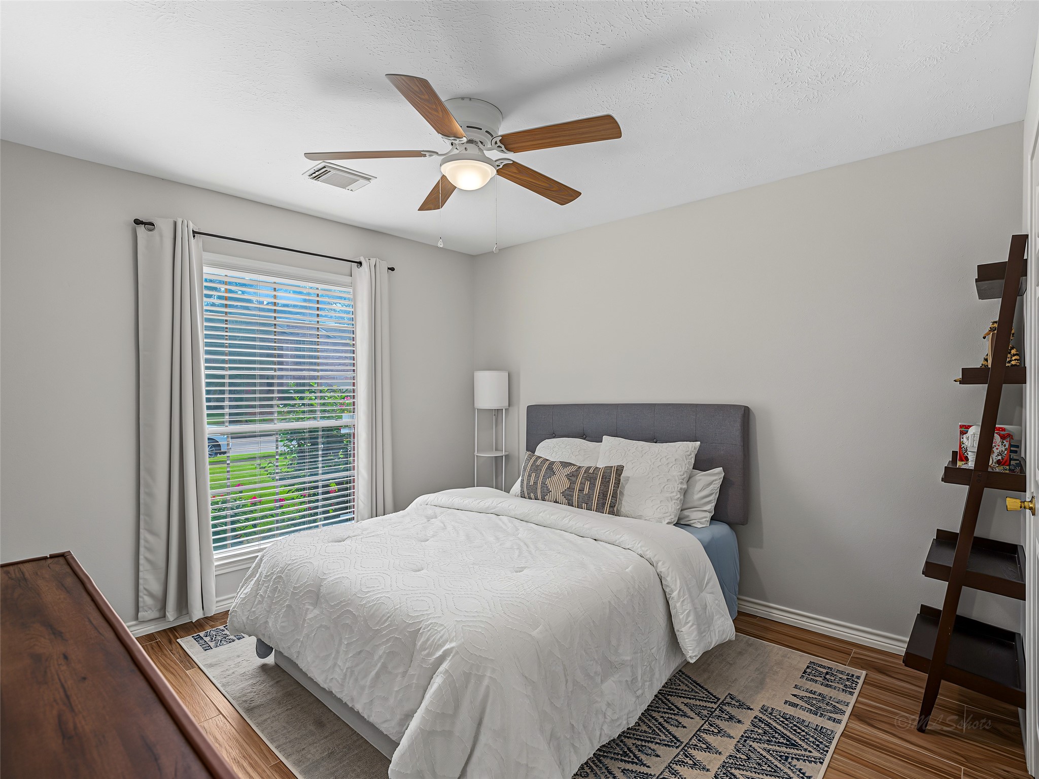 1310 Hidden Canyon Road Katy, TX 77450 - Photo 26 of 40 Cozy bedroom with natural light
