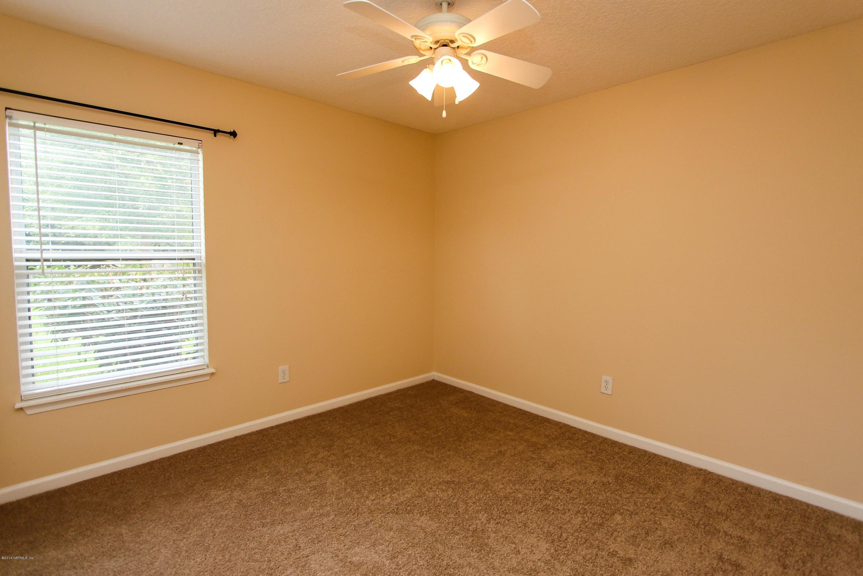 1252 Ribbon Road St. Johns, FL 32259 - Photo 19 of 27 a view of an empty room with a window