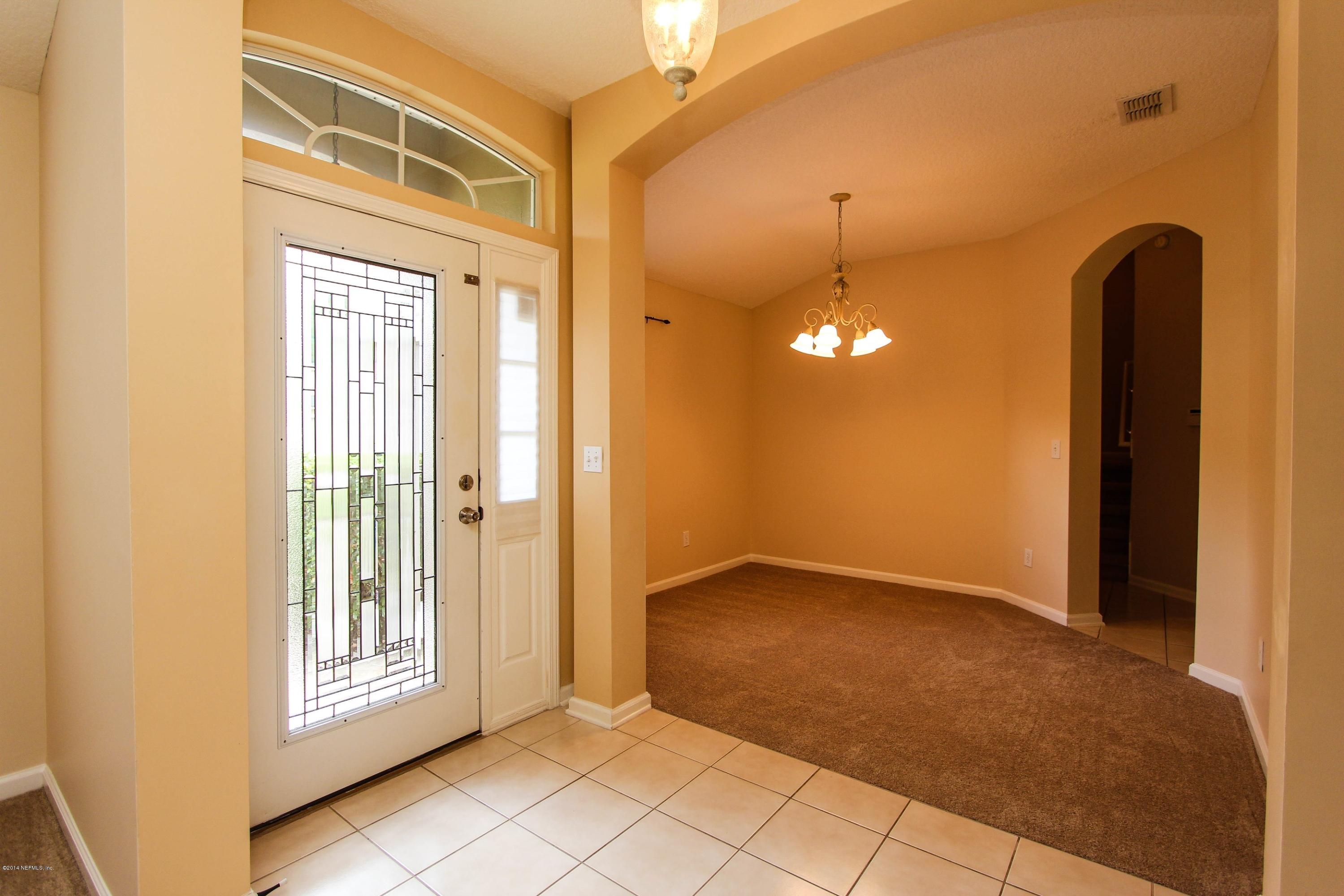 1252 Ribbon Road St. Johns, FL 32259 - Photo 4 of 27 a view of an empty room with glass door