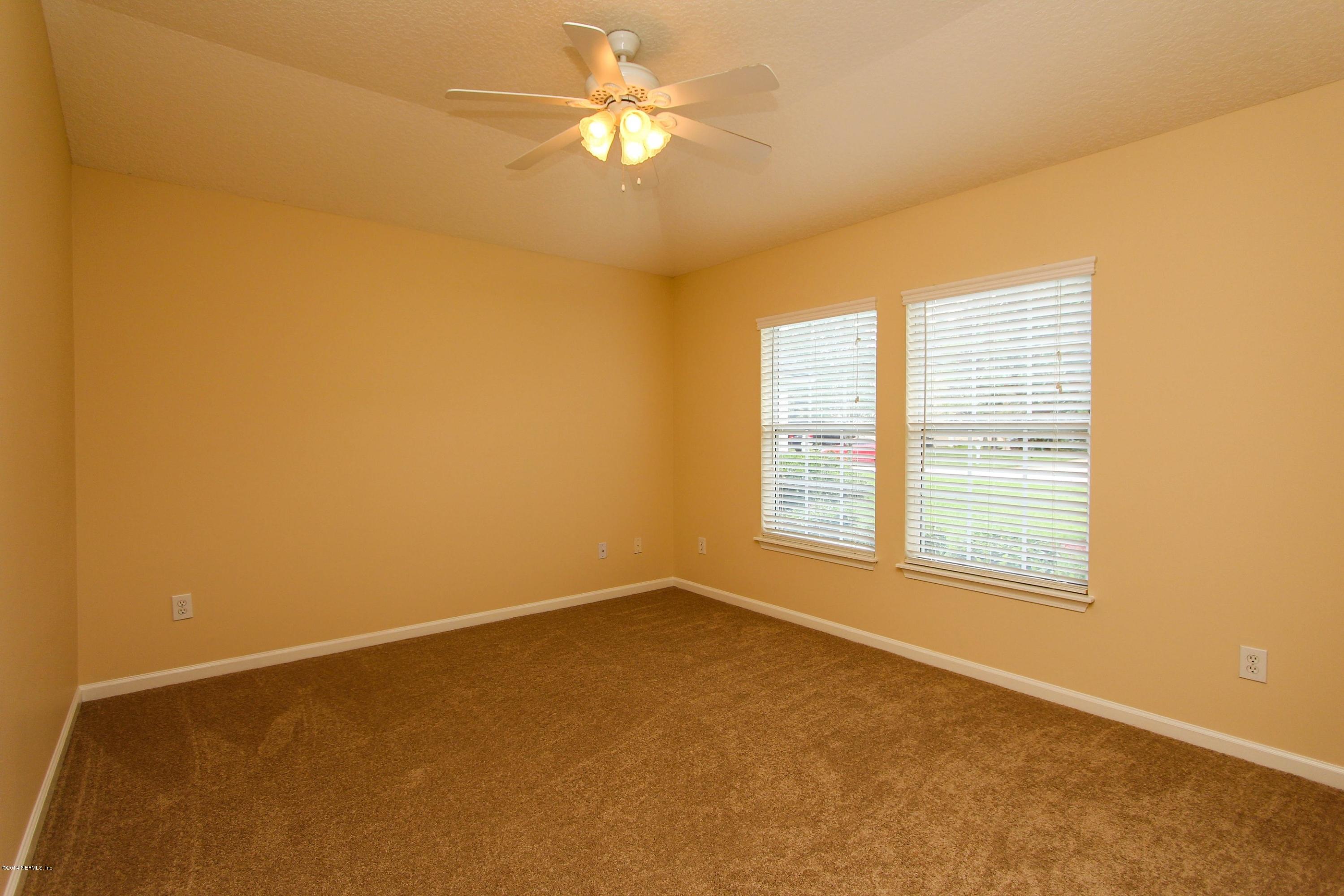 1252 Ribbon Road St. Johns, FL 32259 - Photo 6 of 27 a view of an empty room with a window