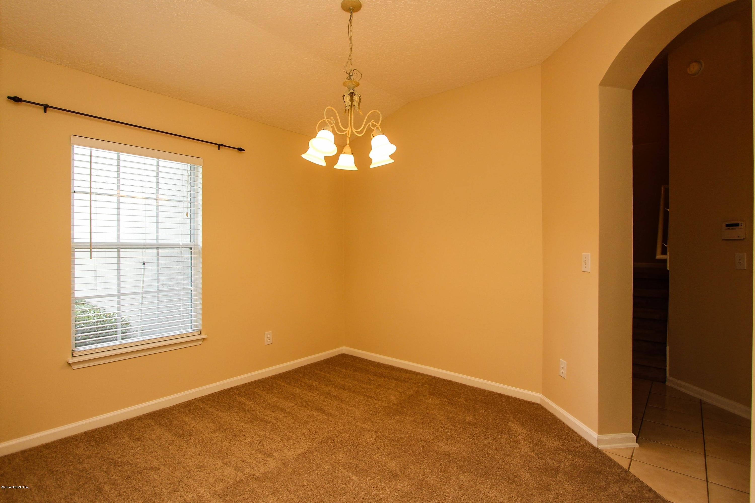 1252 Ribbon Road St. Johns, FL 32259 - Photo 7 of 27 an empty room with windows