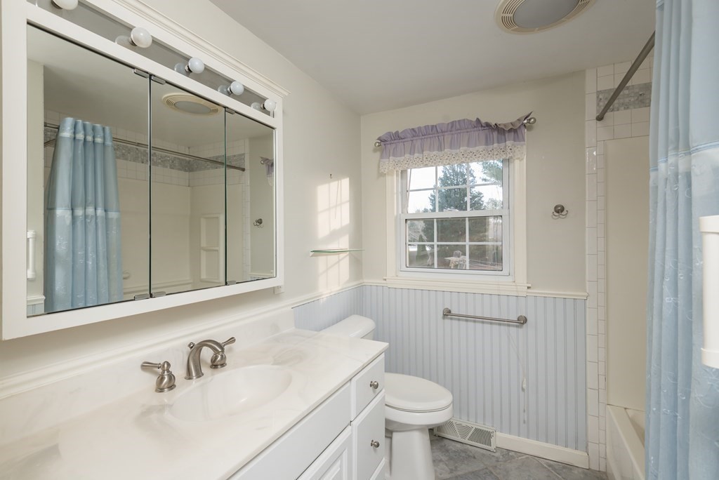 26 Carver Road Plymouth, MA 02360 - Photo 12 of 25 a bathroom with a sink toilet a mirror and shower