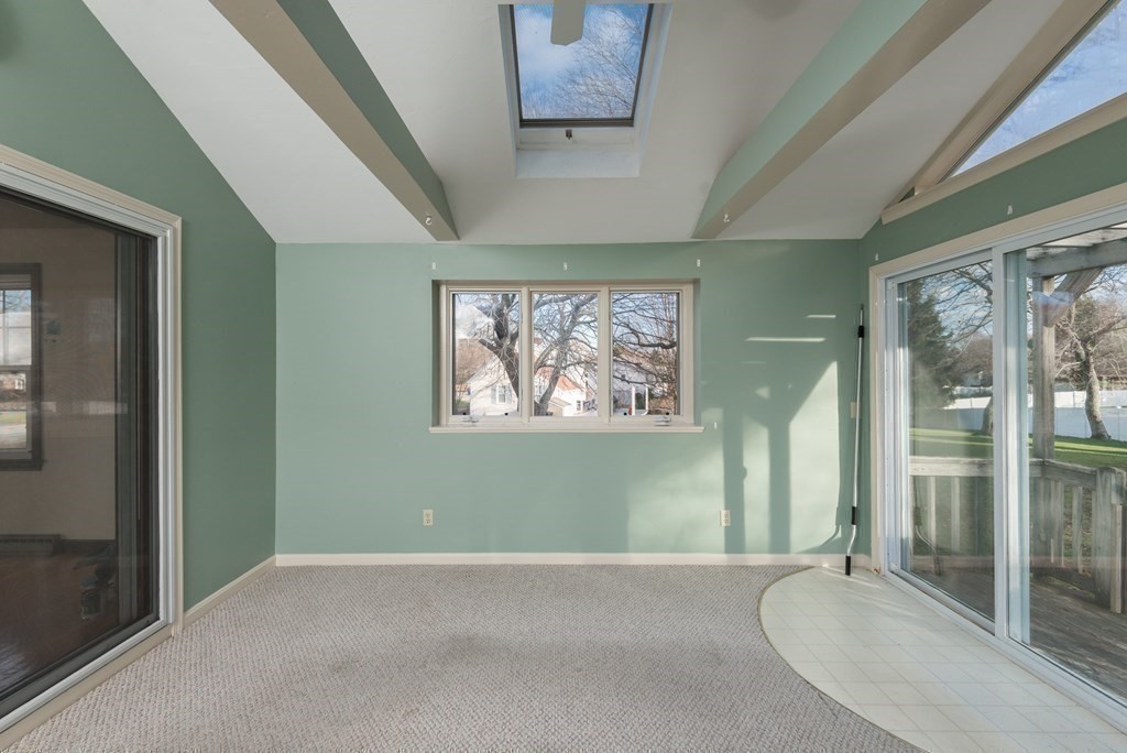 26 Carver Road Plymouth, MA 02360 - Photo 19 of 25 an empty room with a window and doors
