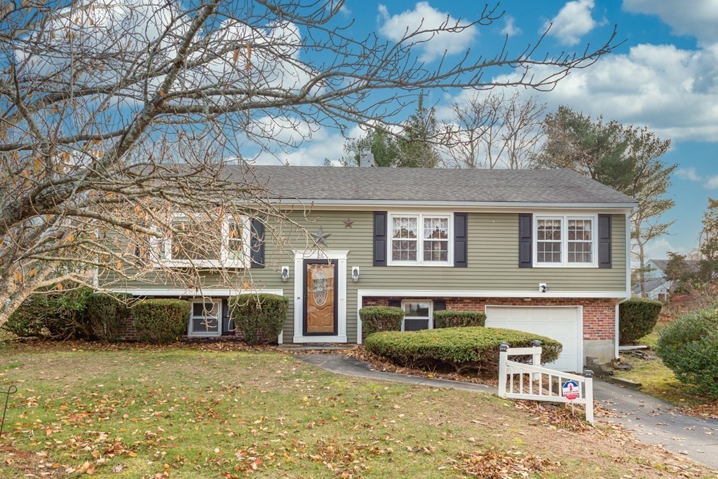 26 Carver Road Plymouth, MA 02360 - Photo 2 of 25 a front view of a house with a garden