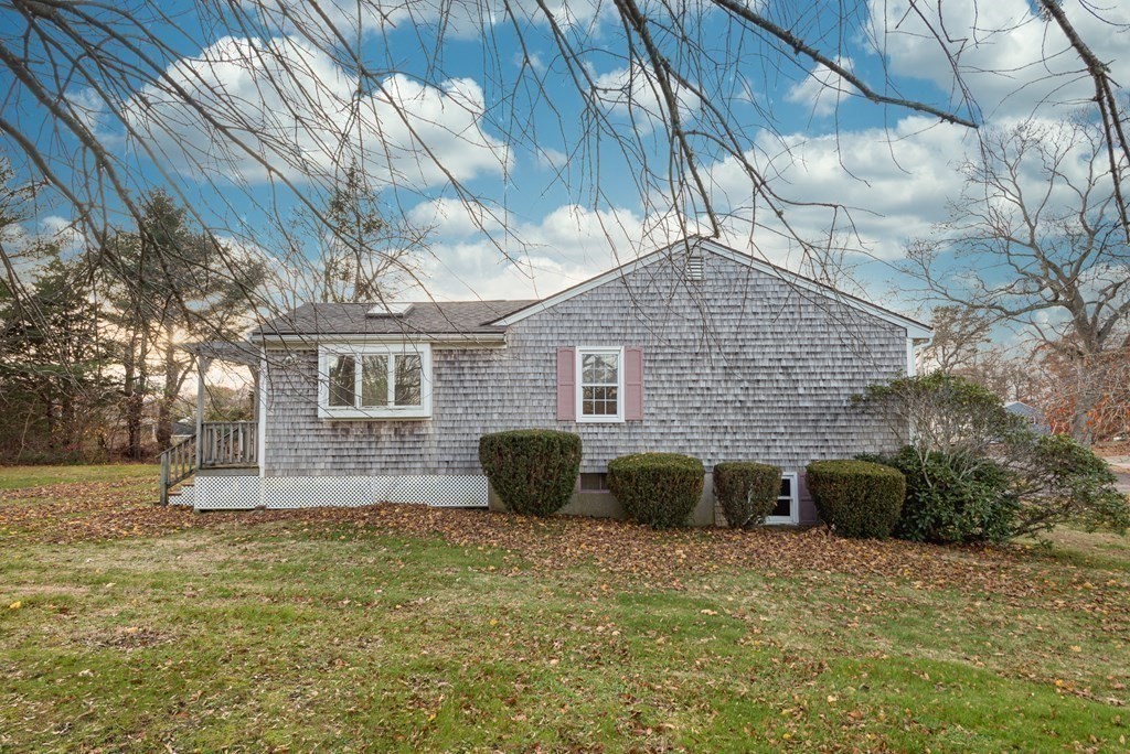 26 Carver Road Plymouth, MA 02360 - Photo 21 of 25 a front view of a house with a yard