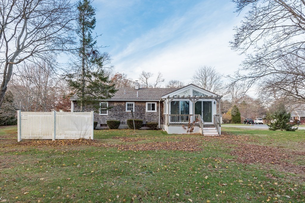 26 Carver Road Plymouth, MA 02360 - Photo 24 of 25 a front view of a house with a yard