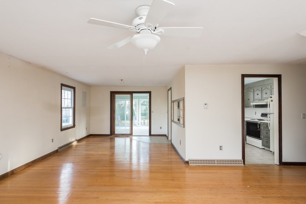 26 Carver Road Plymouth, MA 02360 - Photo 5 of 25 a view of an empty room with window and wooden floor