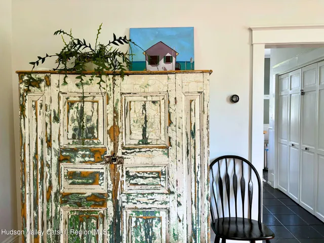 a dining room with furniture and windows